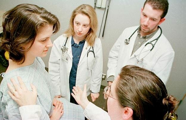 doctors with patient