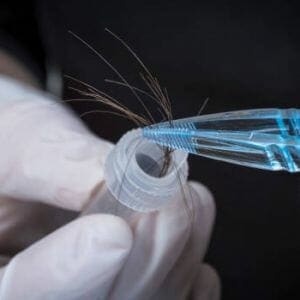 A sample of hair putting inside a tube