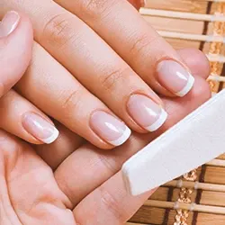 Close up shot of fingernails full of keratin