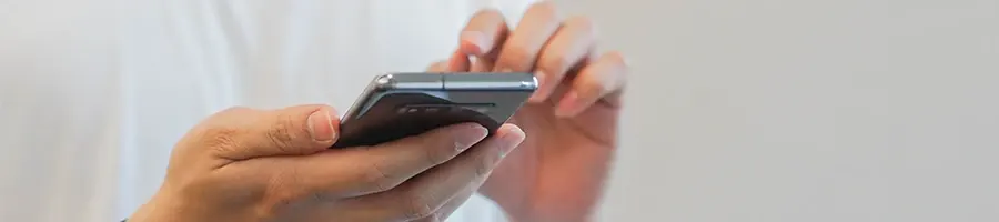 A person reading users review on a smartphone